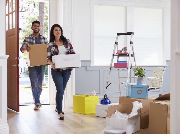 Hispanic Couple Moving Into New Home Together